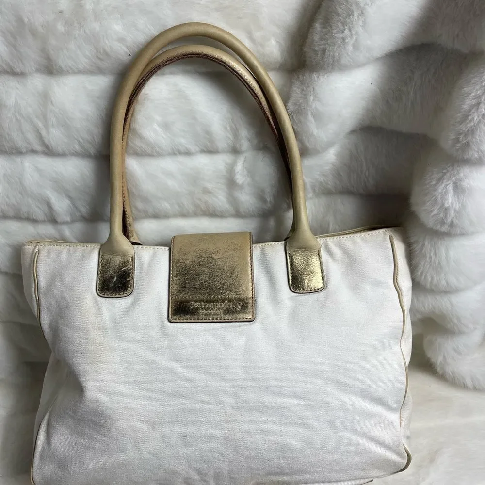 Vintage Kate spade beige canvas and faded gold trims shoulder bag.